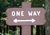 Confusion One way sign with a double ended arrow